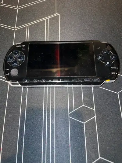 Playstation Portable - Black Model, 32MB memory stick, View more