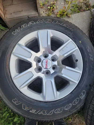 Gmc Sierra 20" Rims and tires both in great shape tires have only like 8k on them. They are 275/60/2...