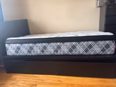 Selling a twin bed with 2 storage boxes and mattress in good, used condition, perfect for a child's...