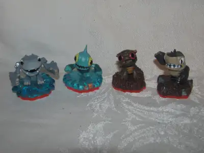 Selling four of the tiny figures from Skylanders Trap Team. Good working condition. $7 each or all f...