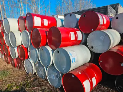 Used empty barrels for sale. Previously contained polyurethane spray foam components and polyurea co...