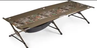 Features Huntshield Camouflage Camp Cot features an easy-fold frame system for easy transport and st...