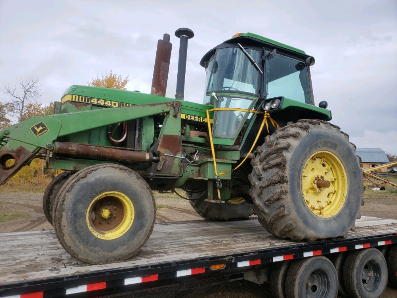 John deere 4440 with loader with bucket snow pusherpallet fork