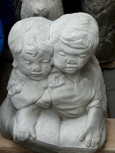 stone girl boy reading statue, View more