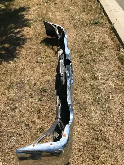 Chrome rear bumper for a dual exhaust 1999 Dodge Ram pick up truck