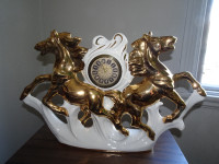 Vintage clock with Horses