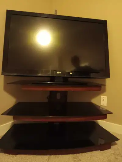 LG 42"Flat screen Tv (model 42CS560) with 3-tier stand, View more