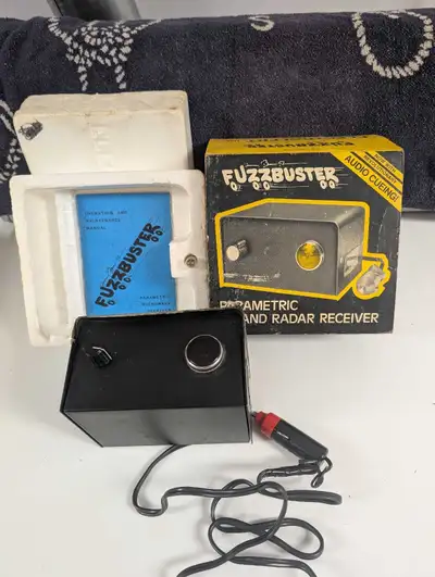 Original " Fuzz Buster" radar detector, in box.