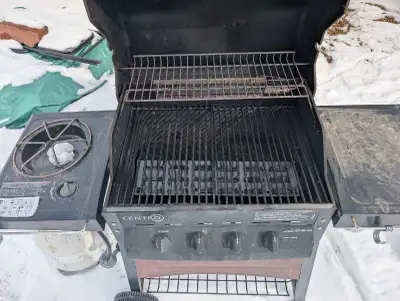 I am selling a Used Centro Barbecue that includes a 20 LB Propane Tank. It is approximately a year o...