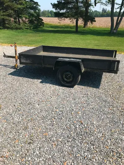 Farm trailer Inside dimensions 54” x 100” x 9” high Overall dimensions 74” x 146” 15” tires 1 7/8 hi...