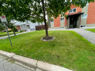 Lovely. 2 bedroom, spacious living room area, dining area,. Wood throughout unit. Includes fridge an...