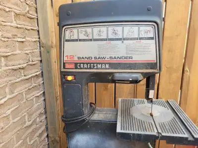 This is a used Craftsman 12-inch band saw and sander combo, perfect for small woodworking projects a...