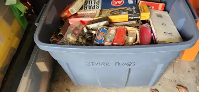 Large tote full of antique spark plugs. Open to offers.