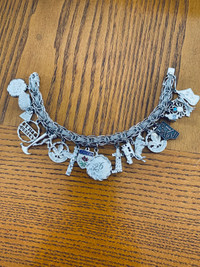 Sterling silver charm bracelet and individual charms 