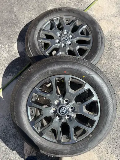 Brand new unused 2026 Toyota tundra wheels with brand new yokohama geolandar x cv tires. 20” wheels...