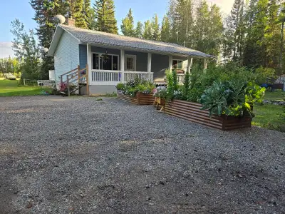 Welcome to the hobby farm/gardener enthusiasts dream! This gorgeous 3 bedroom plus den, 2 bathroom h...