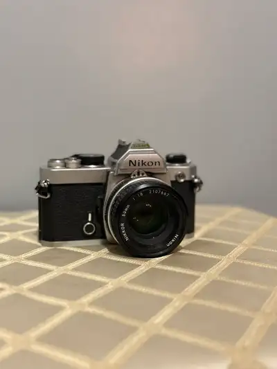Nikon (NEAR MINT) FM SLR 35mm Film Camera, View more