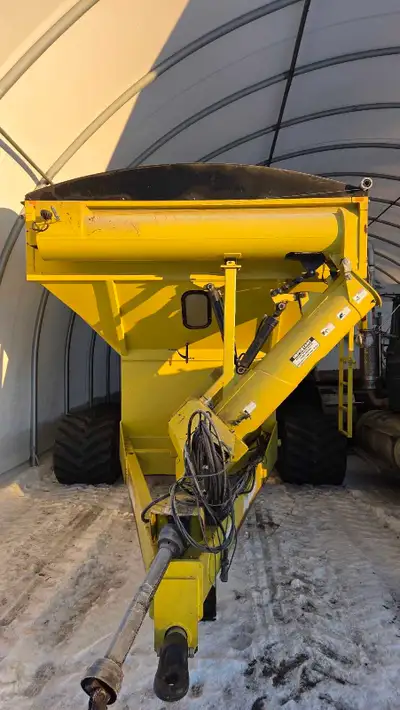 Degelman shuttle cart 800 with 30inch camso, formerly Landluvr, tracks. Scale with Digi Star 560 ind...