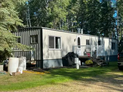 12x60 furnished 1973 Atco trailer with skid and 10 x10 deck ,2 bedroom , 1 bath , comes with wood st...