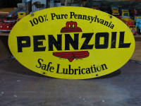 Pennzoil painted double sided oval sign for sale