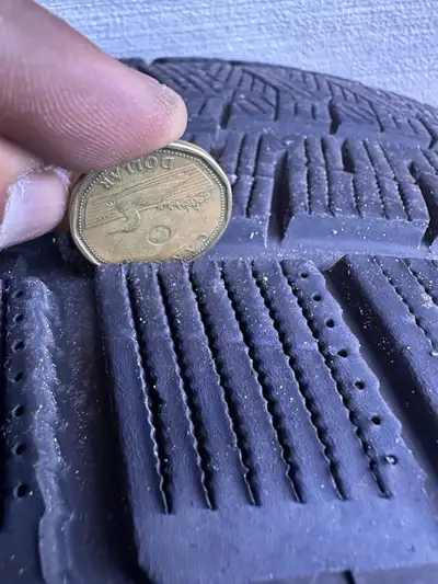 Kapsen 265/50R20 winter tires feature a solid tread depth as shown in the photo, ensuring reliable t...