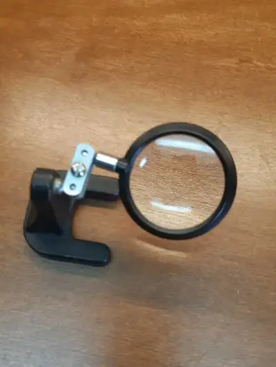 vintage magnifying glass with cast iron base, View more