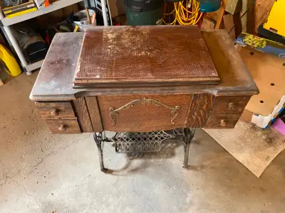 Antique Eldredge treadle sewing machine, View more