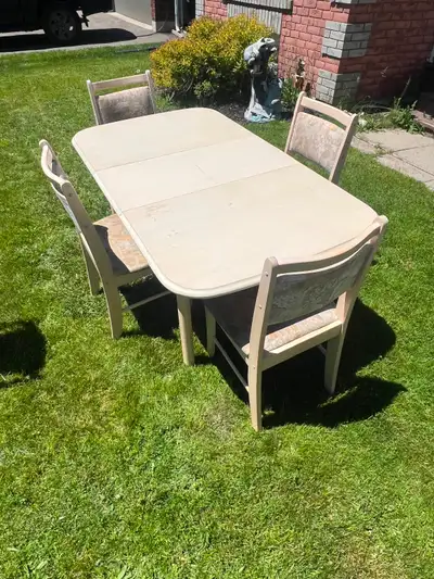 Kitchen Table with leaf extension and four chairs, View more
