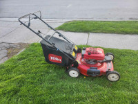 Toro Self Propelled 22 inch cut Lawn Mower with a bag.