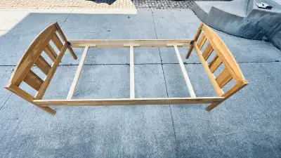 TWIN WOODEN BED in good condition, View more