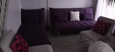 Set of 2 elegant futons, used a few years, bought from Structube. Dark violet color The first one -...