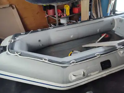 12ft Aluminum floor 2 benches Transom wheels Foot pump Worked great last year just upgraded. Has a p...