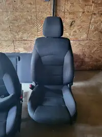 Black Chevy Cruze seats with airbags and headrests