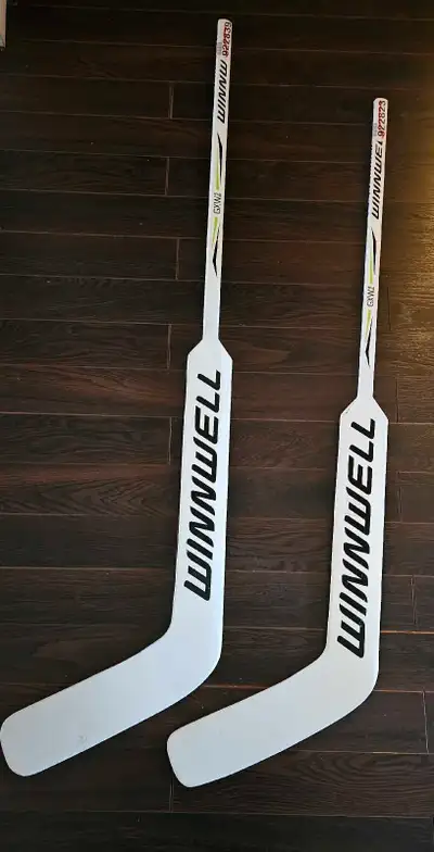 Pair of Winnwell GXW7 hockey sticks, View more