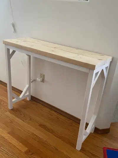 Perfect farmhouse style table for the entryway in your home. Also is a great piece for behind a sofa...