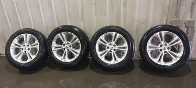 Set of Motomaster (Engineered by Cooper) 235/55R18 Winter Edge tires (DOT3221) on Ford Edge Rims. Th...