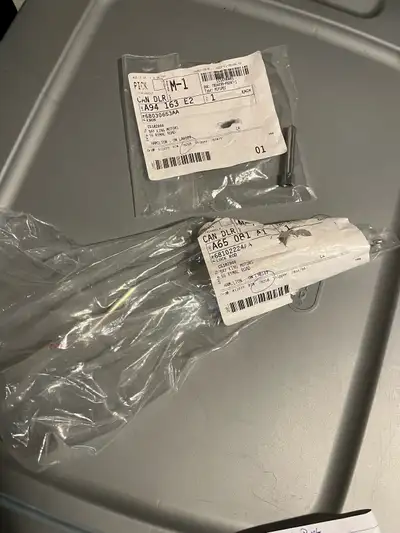 Dodge Grand Caravan Lock Parts. Brand new. Not opened. Ordered wrong part. Lock knob part number 680...