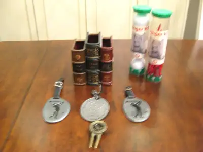 I have some Golf Themed Items for sale. They include a Polyresin Stacked Golf Books Desk organizer P...