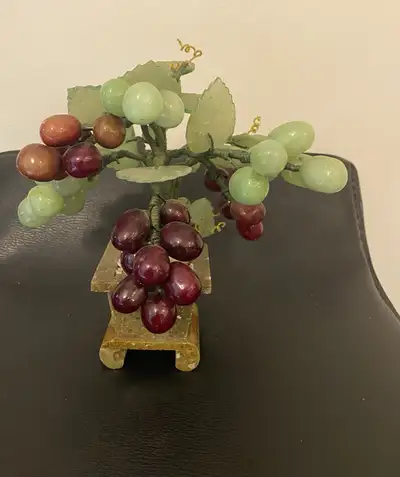 A beautiful vintage Chinese Jade stone grape clusters in excellent shape and condition.