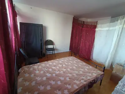 Living room for rent with bed in a furnished 2 bedroom
