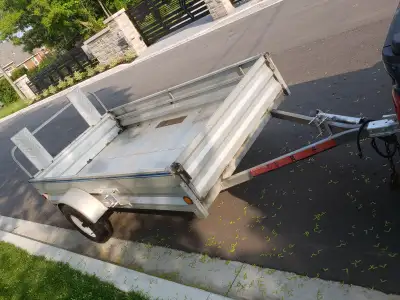 Galvinized utility trailer 5x10 Extends to 11 ft long Great utility trailer Good shape everything wo...