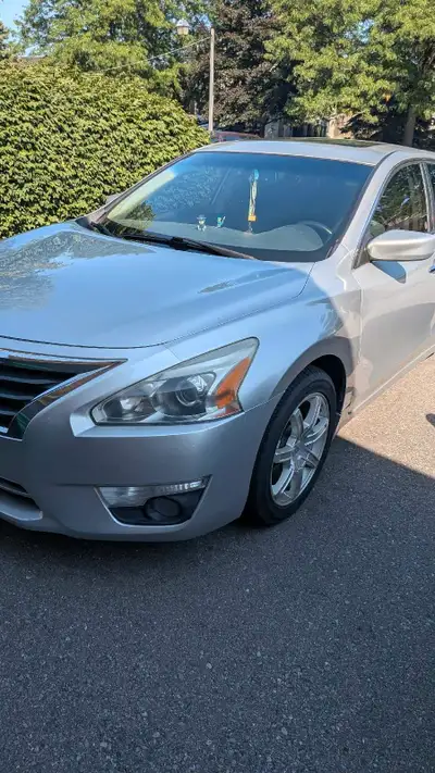I'm selling a 2013 Nissan Altima, a reliable sedan that offers a blend of fuel efficiency and comfor...
