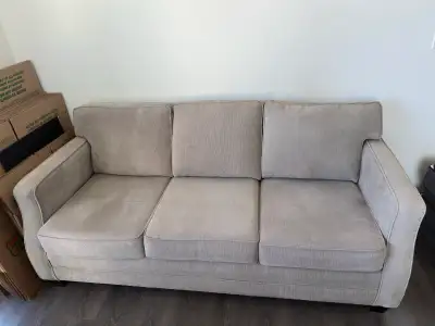 Grey sofa from The Brick, View more