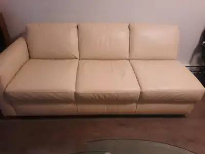 Free Natuzzi brand white leather couch. Only 2 years old and in good condition, bought brand new. YO...