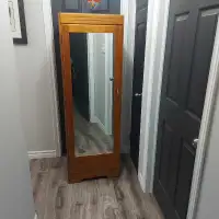 Vintage mirrored armoire