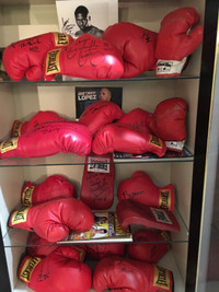 boxing signed gloves and boxing poster with boxing VHS