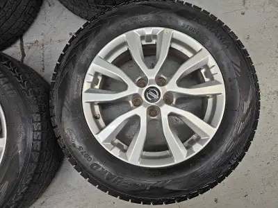 Set of 4 original 17 inches Nissan rogue rims with Yokohama winter tires on them 225/65/R17. Rims an...