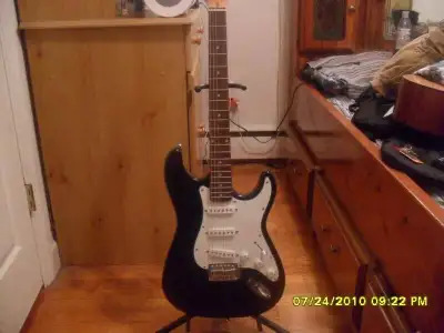 Robson Electric Guitar body is extremely light, has good, fully adjustable action, and really nice p...