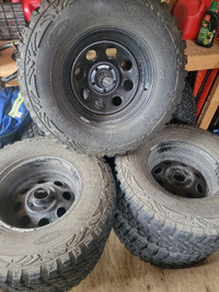 17" Procomp 97 steel wheels 5x5 and Procomp MT2 315/70R17's