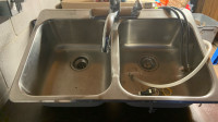 Double kitchen sink with faucet and wash